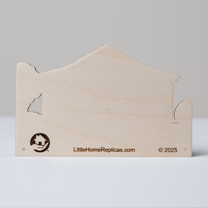 Wooden house-shaped replica with a plain back showing 'LittleHomeReplicas.com' branding on a gray background