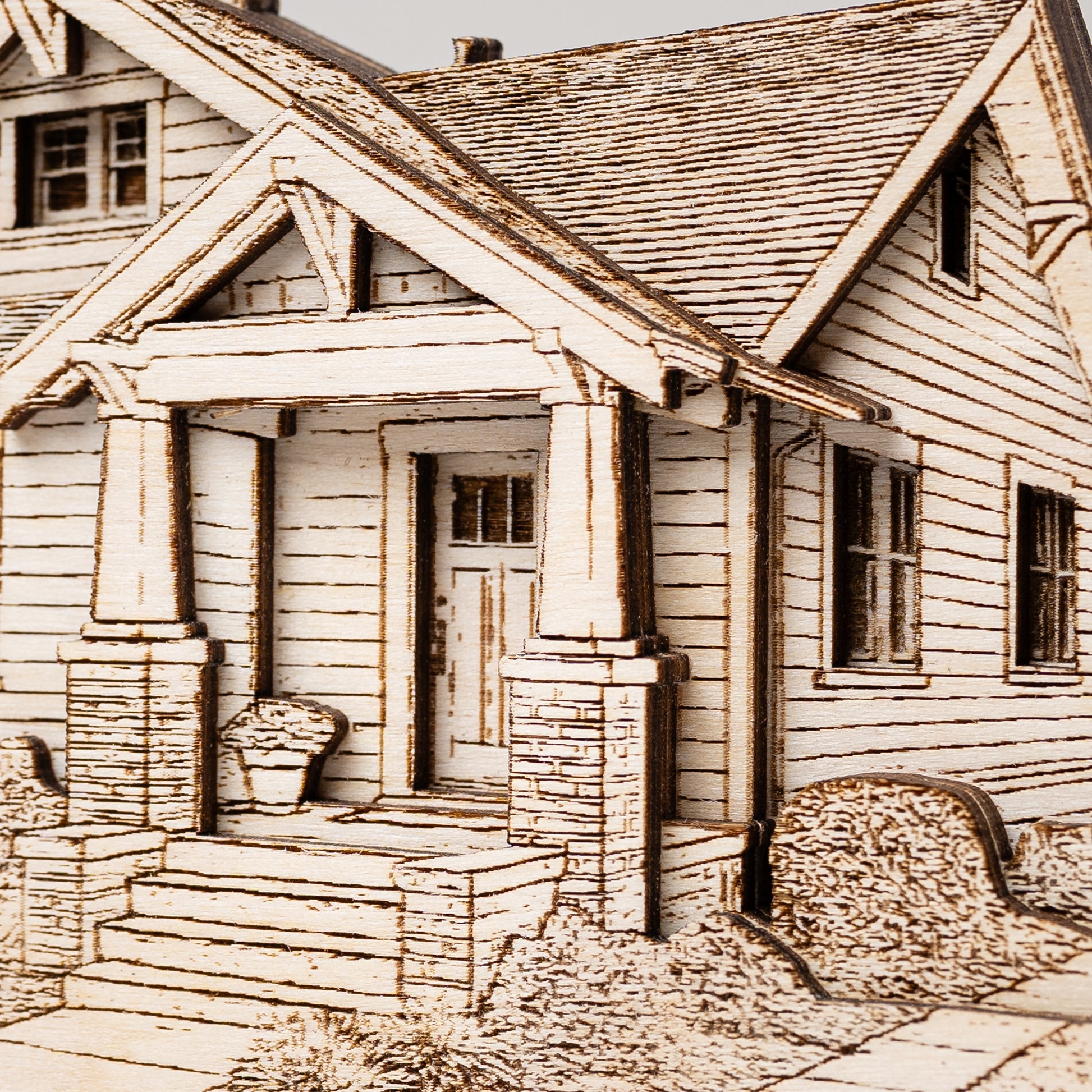 Detailed illustration of a house with a porch and steps.
