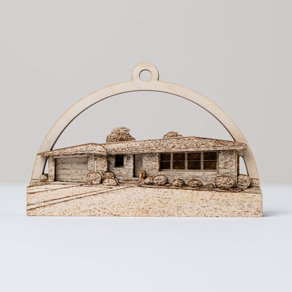 Wooden ornament of a house with an arch on a white background